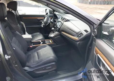 2021 Honda Cr-V Awd Touring z USA, uszkodzony, nr VIN 2HKRW2H93MH616935